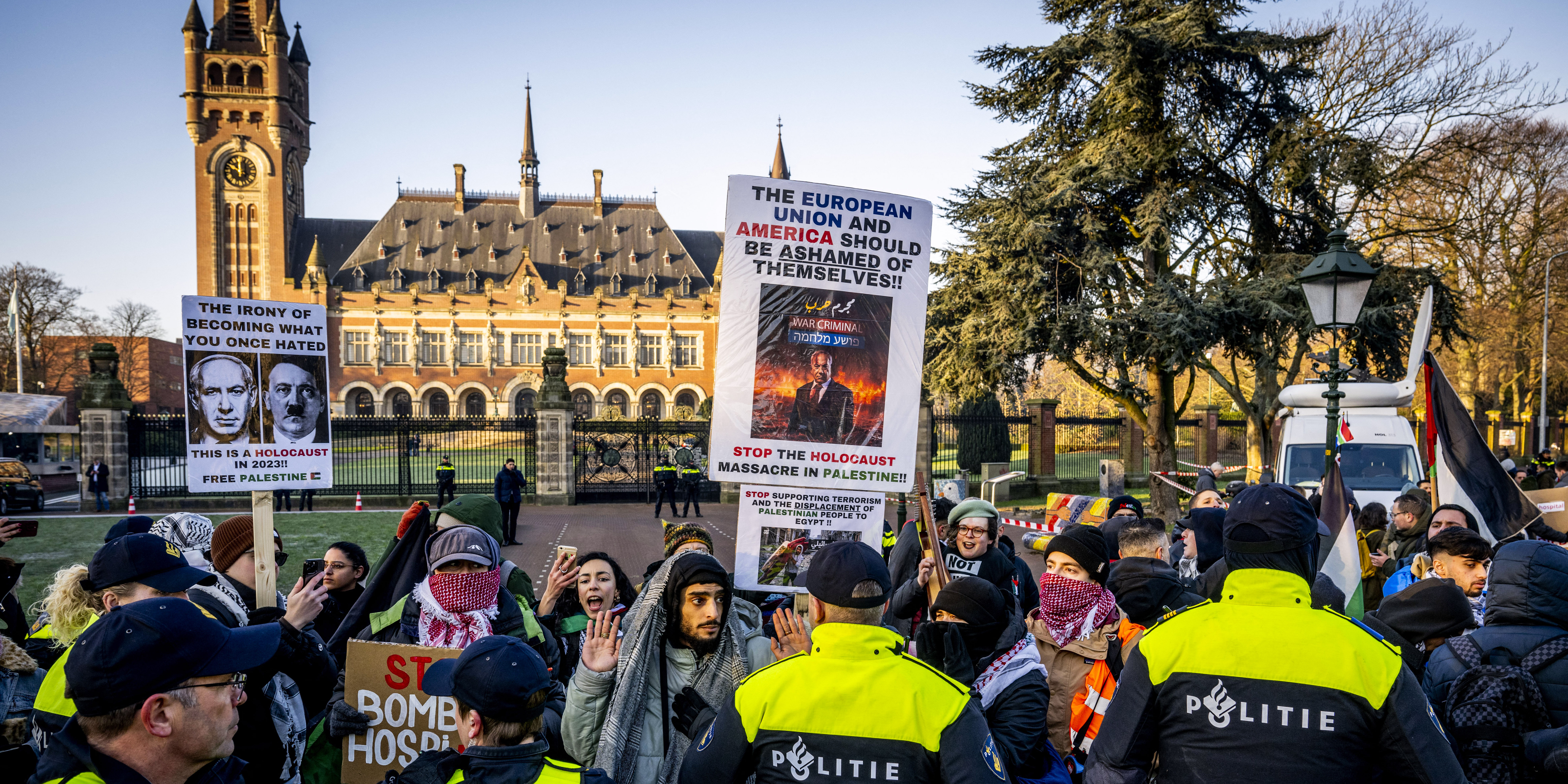 Police officers disperse protestors during a demonstration in support of Palestinian, simultaneously with the hearing at the International Court of Justice (ICJ) on a genocide complaint by South Africa against Israel, in The Hague, January 11, 2024. Israel is facing charges of "genocidal acts" in Gaza before the International Court of Justice on January 11, 2024, brought by South Africa and described by the Israeli president as "atrocious" and "absurd". (Photo by Robin Utrecht / ANP / AFP) / Netherlands OUT (Photo by ROBIN UTRECHT/ANP/AFP via Getty Images)