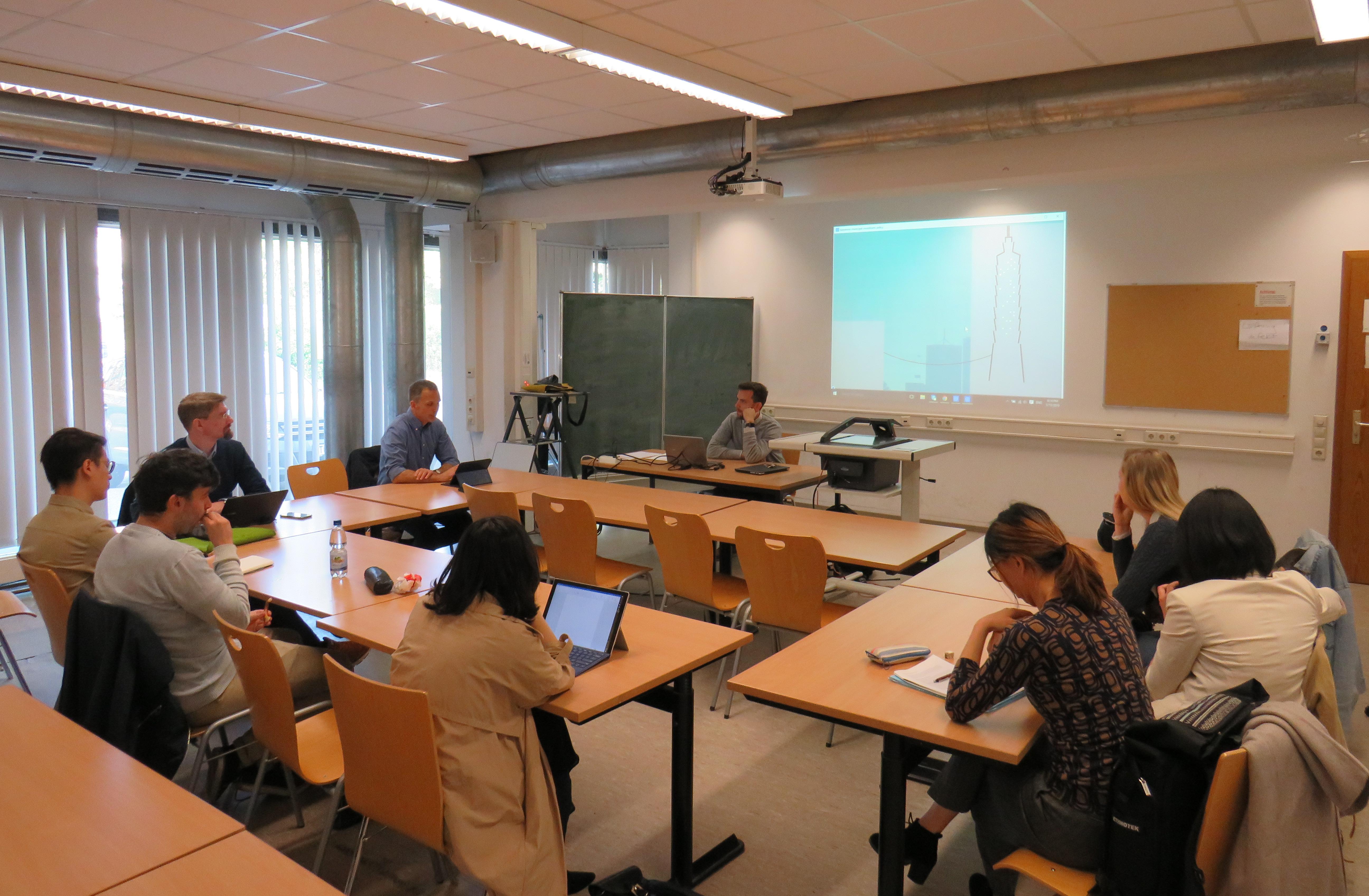 Mark Henderson presenting his Ph.D. research in the Taiwan Colloquium