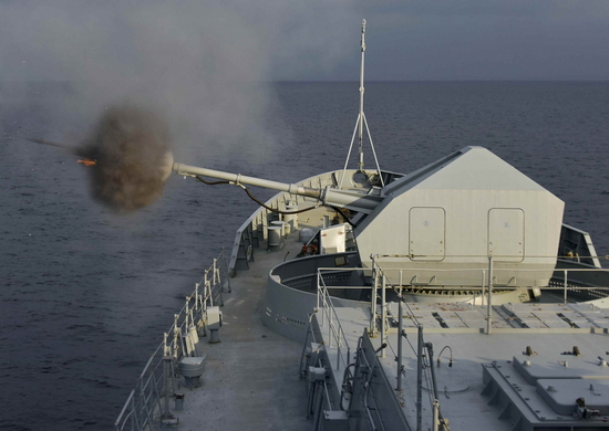 File:Russian naval vessel firing cannon during exercise.jpg