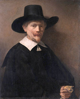 Portret van een man met handschoenen in de hand