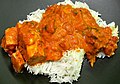 Image 72Chicken tikka masala, served atop rice. An Anglo-Indian meal, it is among the UK's most popular dishes. (from Culture of the United Kingdom)