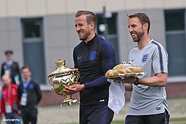 Football team manager Gareth Southgate and football player Harry Kane taking part in a bread and salt ceremony after arriving in Saint Petersburg, Russia, 13 June 2018