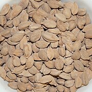 White cardamom pods in a bowl