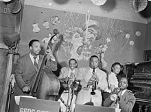 Gene Sedric, Danny Settle, Slick Jones, Mary Lou Williams kaj Lincoln Mills, prezentado en The Place, Novjorko, proks. julion de 1946. Foto de William P. Gottlieb