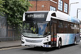 Photograph of white Volvo BZL single-decker demonstrator bus, with a destination display reading "EY Electric"