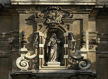 Statue of Saint Begga, above the portal