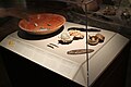 Red Dish and Jade Pendants; Shell and Jade Pendant; Stone Eccentrics and Bloodletters; Small Bowls and Jade Bead