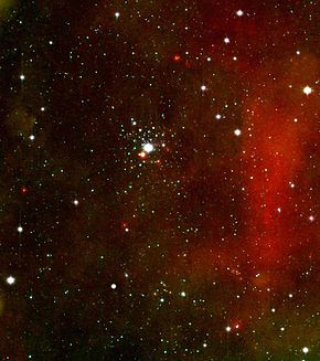 Otevřená hvězdokupa NGC 2362 obklopující hvězdu Tau Canis Majoris na infračerveném snímku z dalekohledu Spitzer.