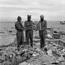 4th Division with captured German flag at Sidi Omar