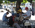 Shoeshiners at work in Playa del Carmen, Mexico 2009