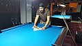 Image 6A player racking the balls (from Pool (cue sports))