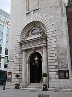 Western doorway in tower showing entablature and rustication