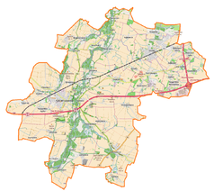 Mapa konturowa gminy Kąty Wrocławskie, blisko centrum na dole znajduje się ikonka pałacu z opisem „Pałac w Krobielowicach”