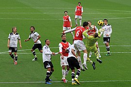 Laurent Koscielny clashes with Heurelho Gomes 2.jpg