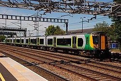 London Midland 350120 stops at Rugeley with a Crewe - London Euston service.