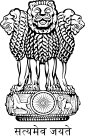 Three lions facin left, richt, an toward viewer, atap a frieze containin a gallopin horse, a 24-spoke wheel, an an elephant. Unnerneath is a motto: "सत्यमेव जयते".