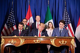 President Enrique Peña Nieto, President Donald Trump, and Prime Minister Justin Trudeau sign the new USMCA agreement during the 2018 G20 summit; November 2018.