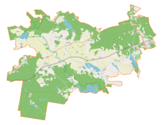 Mapa konturowa gminy Gietrzwałd, blisko lewej krawiędzi znajduje się punkt z opisem „Dłużki”