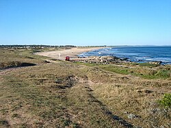 The resort and the beach of Punta Negra seen from the homonymous peninsula.