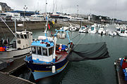 Fishing boat with a winch-operated lift net in Quiberon, France