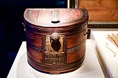 A round-fronted chest from the antechamber. The knob on the chest that contains Tutankhamun’s cartouche had been written over the name of Neferneferuaten.[81]