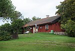 Stormberg i Bärbo socken 2011. 2023 Bilden visar två ditflyttade uthus från annan gård. Endast två flyglar står kvar på tomten. En gammal byggnad är flyttad till Nääs säteri.