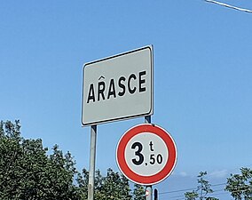 Cartéllo stradâle in arascìn