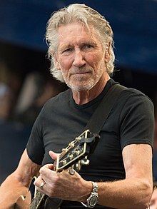 Roger Waters playing bass guitar