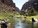 A small river flowing through a rocky canyon