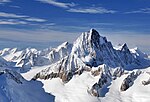 A range of tall, snowy mountains.