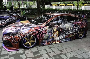 A Mazda 3 with an Itasha style wrap