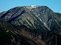 Mount Akaishi seen from Mount Kamikochi, The Mountain hut can be seen at the peak.