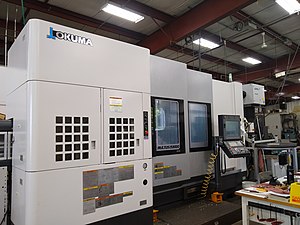 An Okuma MULTUS U3000 multi-tasking machine with automatic tool changer at Lampin Corporation in the Blackstone Valley of Massachusetts.