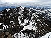 A view of Pizzo Coca from Pizzo Redorta. Literally, Coke Peak or Mountain of Coal, Pizzo Coca is the tallest mountain in the Bergamo Alps.