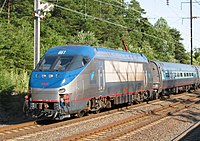 Silver and blue electric locomotive with cabs at both ends