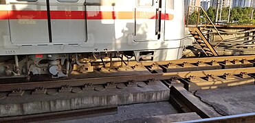 GRS TWC antenna & cab signal pickup coil beneath a Shanghai Metro Line 1 train.jpg