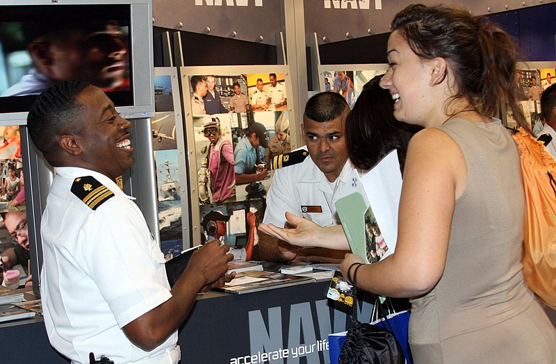 File:US Navy 081031-N-3446M-828 Lt. Cmdr. Kendrick Brown shares a laugh with a visitor at the Navy exhibit during the American Indian Science and Engineering Society (AISES) 30th Annual National Conference.jpg