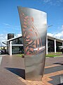 Southern Memorial Square waka sculpture, with the New Lynn War Memorial Library in background.