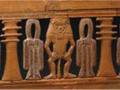 A depiction on the back of Hatnofer's chair. The amulets are on the sides. The pillars on the ends.