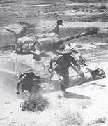 Pakistani soldiers and sherman tank during Indian invasion of Lahore (1965).jpg