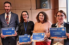 à gauche : Michael Storper (prix Vautrin Lud) de gauche à droite :A gauche Michael Storper. Puis Aude Le Gallou, Nora Nafaa et Elsa Filâtre (prix de la thèse du CNFG)