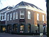 Winkel met bovenwoning