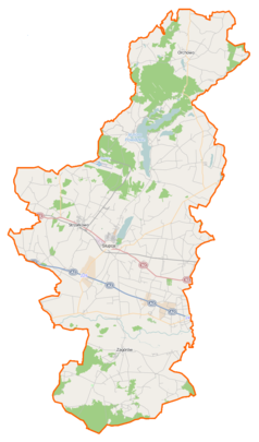 Mapa konturowa powiatu słupeckiego, po lewej znajduje się punkt z opisem „Brudzewo”