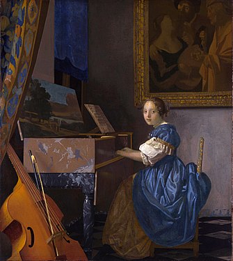 Jeune femme jouant du virginal, Londres, National Gallery. L'un des derniers tableaux peints par Vermeer[142].