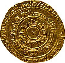 gold coin with circular Arabic inscriptions