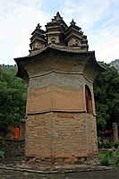 The Nine Pinnacle Pagoda of Shandong, completed by 756 and crowned with an unusual set of miniature pagodas; it is also unique for its octagonal, rather than square, base plan.