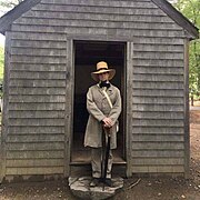 Richard Smith as Thoreau, at Thoreau replica cabin near Walden Pond.jpg