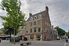 Winkel met bovenwoningen