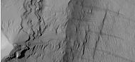 Close-up of some layers under cap rock of a pedestal crater, as seen by HiRISE under HiWish program.