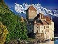 Image 27Château de Chillon, a castle on the north shore of Lake Geneva, against the backdrop of the Dents du Midi (from Alps)